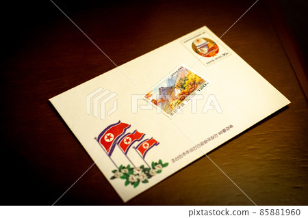 Paper envelope decorated with North Korean communist motifs Paper envelope decorated with North Korean communist motifs 85881960