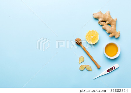 Natural cold and flu home remedies. Natural ingredients for immunity stimulation and viruses protection. top view flat lay Natural cold and flu home remedies. Natural ingredients for immunity stimulation and viruses protection. top view flat lay 85882824