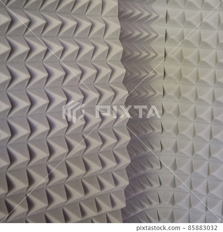 Plates of gray soundproof foam rubber. Sound-absorbing material. Plates of gray soundproof foam rubber. Sound-absorbing material. 85883032
