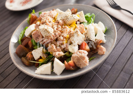 Closeup of salad with fish and vegetables for lunch Closeup of salad with fish and vegetables for lunch 85883612