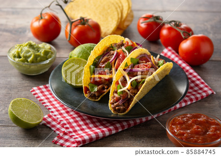 Traditional Mexican tacos with meat and vegetables 85884745