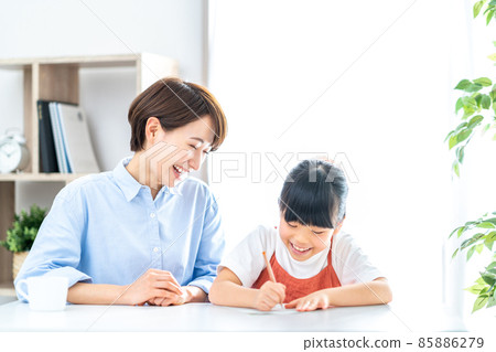 Parents and children studying in the living room. Parents and children studying in the living room. 85886279