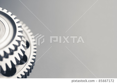 gear wheel steel on gray background with copy-space 85887172