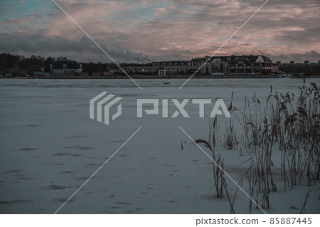 Winter sunset. Frozen Lake. Blue sky. Beautiful melancholy nature. Winter sunset. Frozen Lake. Blue sky. Beautiful melancholy nature. 85887445