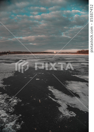Winter sunset. Frozen Lake. Blue sky. Beautiful melancholy nature. Winter sunset. Frozen Lake. Blue sky. Beautiful melancholy nature. 85887452