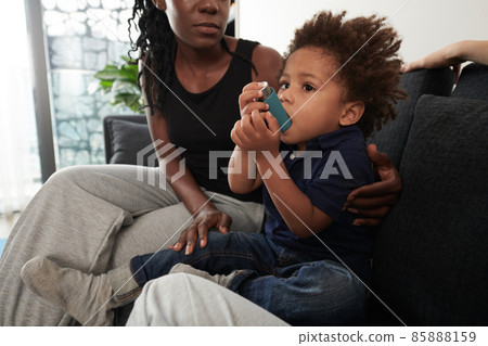 Boy Suffering from Asthmatic Attack 85888159