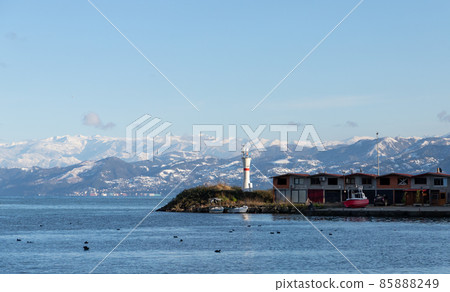 Coastal view with white beacon tower, Turkey 85888249
