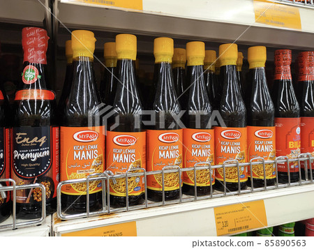 PENANG, MALAYSIA -MARCH 5, 2021: Selected focused on various types of soy sauce used as a cooking ingredient are on sale at supermarkets. Sorted with the brand and it was tagged with the price tag. PENANG, MALAYSIA -MARCH 5, 2021: Selected focused on various types of soy sauce used as a cooking ingredient are on sale at supermarkets. Sorted with the brand and it was tagged with the price tag. 85890563