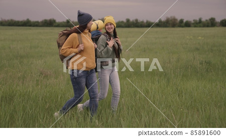 happy female traveler vacation sports hiking with tourist backpacks, dreaming of a fun vacation, girlfriends on a camping trip, adventure exploration in nature, female team, teamwork, active lifestyle happy female traveler vacation sports hiking with tourist backpacks, dreaming of a fun vacation, girlfriends on a camping trip, adventure exploration in nature, female team, teamwork, active lifestyle 85891600