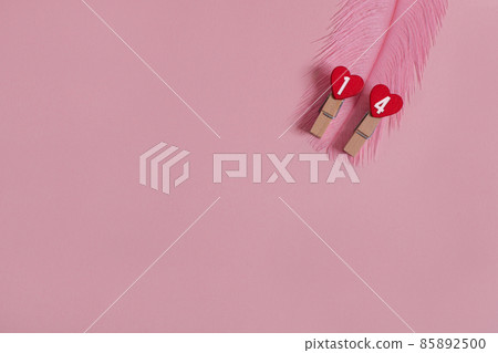pink valentine's day background. two hearts with the numbers 14. High quality photo pink valentine's day background. two hearts with the numbers 14. High quality photo 85892500