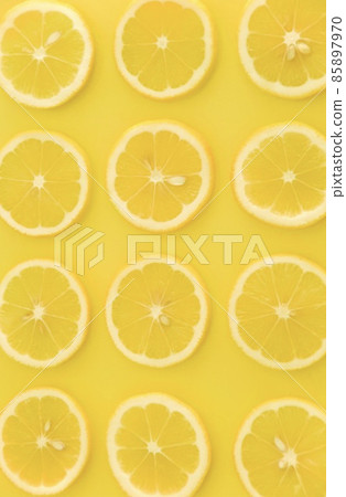 Yellow background lemon slice vertical composition 85897970