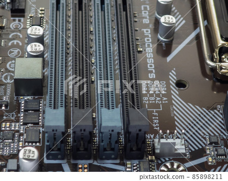 Close up of new MicroATX motherboard board Close up of new MicroATX motherboard board 85898211