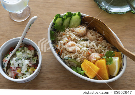 Shrimp pilaf and tabbouleh (Middle Eastern salad) 85902947