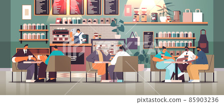 mix race businesspeople sitting at cafe table and drinking coffee during meeting modern restaurant interior 85903236