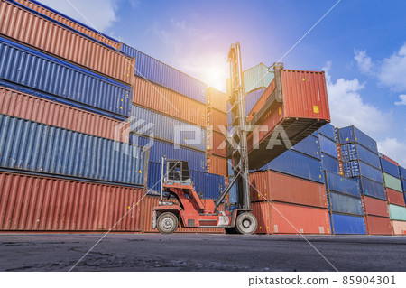 forklift truck seaport waiting container dock crane shipment harbour loading container boxes import and export commercial trade business logistic and transportation of international. forklift truck seaport waiting container dock crane shipment harbour loading container boxes import and export commercial trade business logistic and transportation of international. 85904301