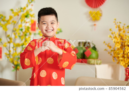 Boy Making Greeting Gesture 85904562
