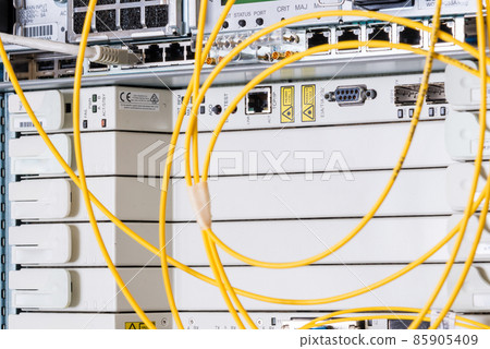 fiber optic cables plugged in network switch panel inside data center fiber optic cables plugged in network switch panel inside data center 85905409