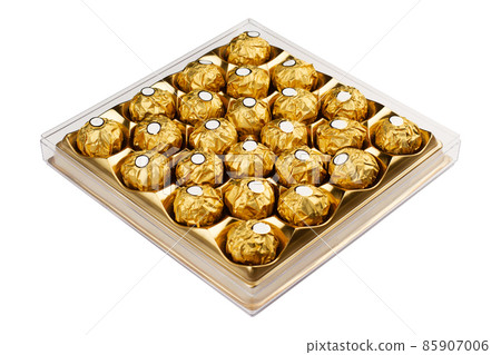 chocolate box with gold wrapping isolated on white 85907006