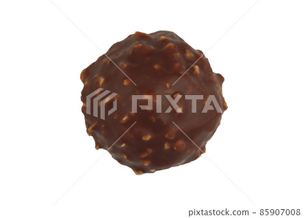 closeup detail of round chocolate candy on white background 85907008