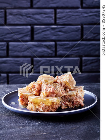 meat aspic, jellied slow cooked meat on a plate meat aspic, jellied slow cooked meat on a plate 85907245