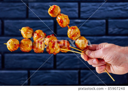 Luk Chin Ping, thai meatball skewers, top view Luk Chin Ping, thai meatball skewers, top view 85907248