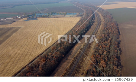 Panoramic Landscape View of Railway, Trees, Agricultural Fields, Lakes on Sunny 85907429