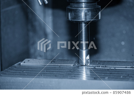 The CNC milling machine rough cutting the injection mold parts by indexable  endmill tools. 85907486