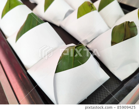 Nasi lemak. Is a signature food in Malaysia. Often eaten as breakfast. Nasi lemak is usually served with sambal, eggs and anchovies. Nasi lemak. Is a signature food in Malaysia. Often eaten as breakfast. Nasi lemak is usually served with sambal, eggs and anchovies. 85909425