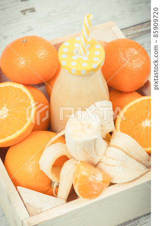 Freshly blended coctail or smoothie from citrus fruits 85909720