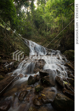 The famous natural waterfall in Maekampong village,Chiangmai province,Thailand.Attractive place for traveller. The famous natural waterfall in Maekampong village,Chiangmai province,Thailand.Attractive place for traveller. 85910145