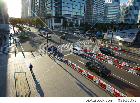 Urban roads and sidewalks illuminated by sunlight 85910355