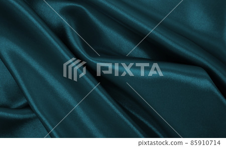 Smooth elegant blue silk or satin luxury cloth texture as abstract background. Luxurious Christmas background or New Year background design 85910714