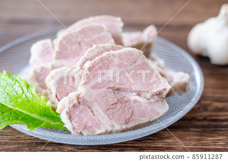 Sliced boiled pork on a plate 85911287