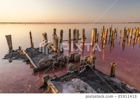 Salt on a pink salt lake at sunset. Pink Salt Lake Hutt Lagoon. Salt on a pink salt lake at sunset. Pink Salt Lake Hutt Lagoon. 85911418