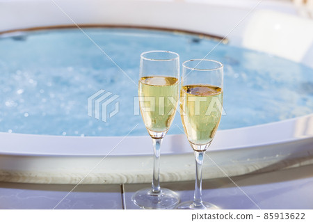 Delicious champagne and a relaxing whirlpool 85913622