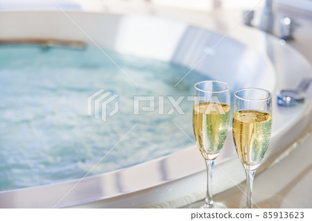Delicious champagne and a relaxing whirlpool 85913623