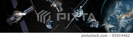 Many spaceships of various shapes in space above the planet Earth. Elements of this image furnished by NASA. Many spaceships of various shapes in space above the planet Earth. Elements of this image furnished by NASA. 85914482