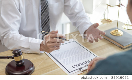 Attorney or judge provides legal advice to the client in the courtroom, Ethics in the courts include justice and impartiality, legal consultant, scales of justice, law hammer, Litigation and justice. Attorney or judge provides legal advice to the client in the courtroom, Ethics in the courts include justice and impartiality, legal consultant, scales of justice, law hammer, Litigation and justice. 85916051