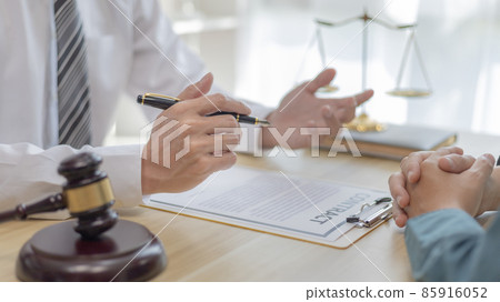 Attorney or judge provides legal advice to the client in the courtroom, Ethics in the courts include justice and impartiality, legal consultant, scales of justice, law hammer, Litigation and justice. Attorney or judge provides legal advice to the client in the courtroom, Ethics in the courts include justice and impartiality, legal consultant, scales of justice, law hammer, Litigation and justice. 85916052