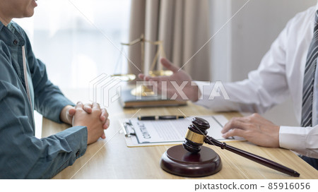 Attorney or judge provides legal advice to the client in the courtroom, Ethics in the courts include justice and impartiality, legal consultant, scales of justice, law hammer, Litigation and justice. 85916056