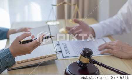 Attorney or judge provides legal advice to the client in the courtroom, Ethics in the courts include justice and impartiality, legal consultant, scales of justice, law hammer, Litigation and justice. Attorney or judge provides legal advice to the client in the courtroom, Ethics in the courts include justice and impartiality, legal consultant, scales of justice, law hammer, Litigation and justice. 85916216