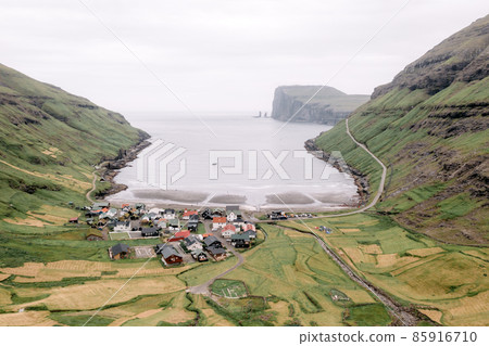 Aerial drone photo flying over Tjornuvik beach Aerial drone photo flying over Tjornuvik beach 85916710