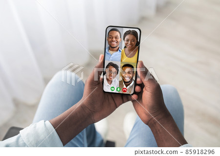 Cropped of african american man having video chat with friends 85918296