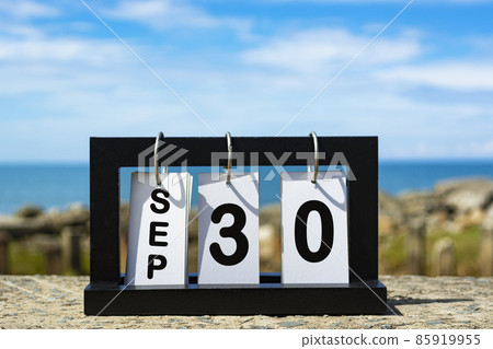 Sep 30 calendar date text on wooden frame with blurred background of ocean. Calendar concept Sep 30 calendar date text on wooden frame with blurred background of ocean. Calendar concept 85919955