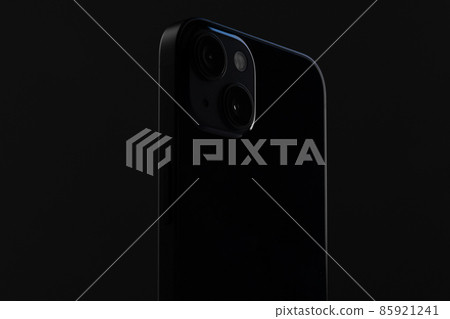 stylish black metal smartphone he with two cameras on a dark isolated background close-up stylish black metal smartphone he with two cameras on a dark isolated background close-up 85921241