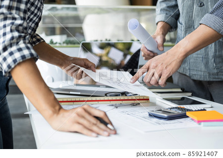 Architecture Engineer Teamwork Meeting, Drawing and working for architectural project and engineering tools on workplace, concept of worksite on technical drawing structure and construction Architecture Engineer Teamwork Meeting, Drawing and working for architectural project and engineering tools on workplace, concept of worksite on technical drawing structure and construction 85921407