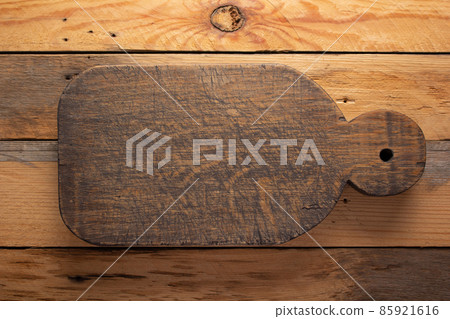 Wood cutting board on wooden background top table Wood cutting board on wooden background top table 85921616