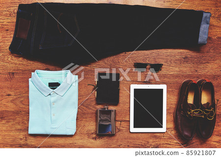 hipster guy's on personal stuff , dark jeans, shirt, shoes, notepad, flask, sunglasses hipster guy's on personal stuff , dark jeans, shirt, shoes, notepad, flask, sunglasses 85921807