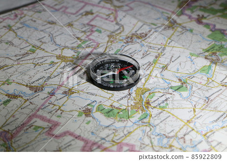 paper topographic map and magnetic compass paper topographic map and magnetic compass 85922809
