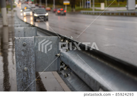 underscrewed nuts and bolts in highway road railing 85924293
